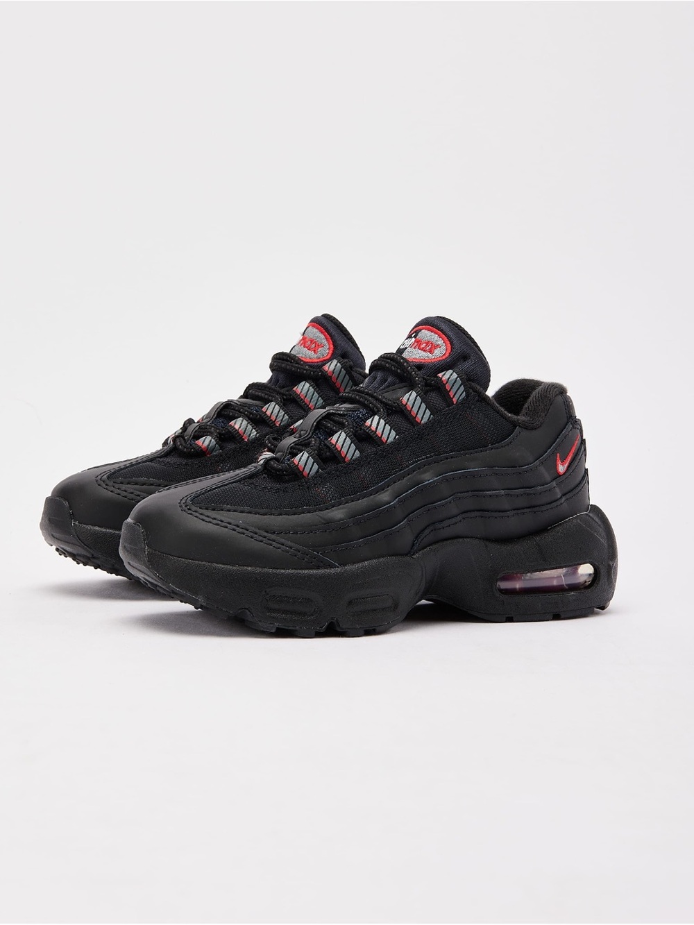 Nike Kids Black Sneakers with Red Accents